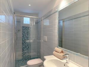 a bathroom with a toilet and a sink and a shower at Gio' Garden in Gabicce Mare +13 photos
