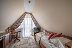 Posteľ alebo postele v izbe v ubytovaní Helan Family & SPA