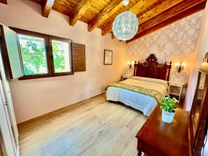 Ένα ή περισσότερα κρεβάτια σε δωμάτιο στο Casa AMARILLA 3 RAPIA +9 φωτογραφίες