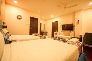 Μια τηλεόραση ή/και κέντρο ψυχαγωγίας στο Hotel White Fields Hitec City, Hyderabad