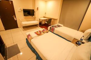 Μια τηλεόραση ή/και κέντρο ψυχαγωγίας στο Hotel White Fields Hitec City, Hyderabad