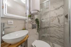 Vannituba majutusasutuses Lisa Zemun Spa Apartment