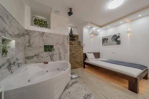 Voodi või voodid majutusasutuse Lisa Zemun Spa Apartment toas