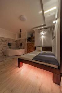 Voodi või voodid majutusasutuse Lisa Zemun Spa Apartment toas