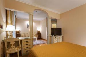 TV a/nebo společenská místnost v ubytování Hotel Firenze