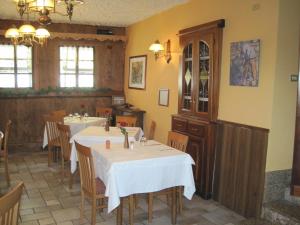 Un restaurant u otro lugar para comer en Hotel Florian