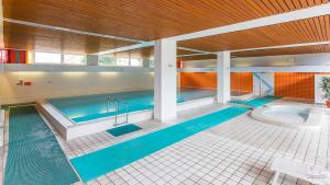 a large swimming pool with two pools at Berolina 316 - Möwennest in Dahme