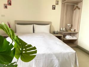 Voodi või voodid majutusasutuse Ling Lai B&B toas