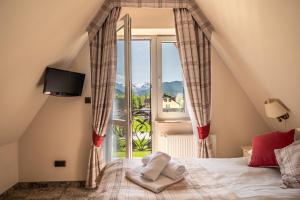 Posteľ alebo postele v izbe v ubytovaní Helan Family & SPA