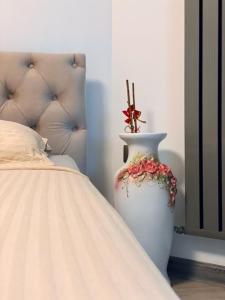 Katil atau katil-katil dalam bilik di Maia Apart 21st by Euxin Accomodations