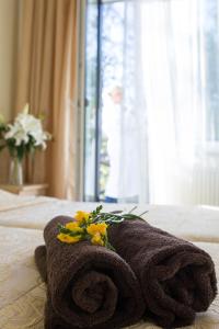 Postel nebo postele na pokoji v ubytování Hotel SPA Arkadia