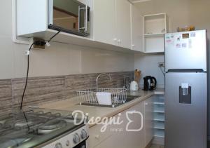 Nhà bếp/bếp nhỏ tại Disegni 04 - Departamento 2 habitaciones Copiapó, Avenida Francisco de Aguirre