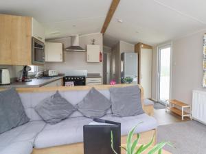Η κουζίνα ή μικρή κουζίνα στο Windermere Lodge
