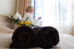 Postel nebo postele na pokoji v ubytování Hotel SPA Arkadia