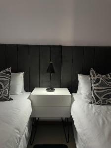 Ein Bett oder Betten in einem Zimmer der Unterkunft Grey Net