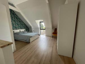 Postel nebo postele na pokoji v ubytování Le loft II