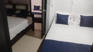 Ένα ή περισσότερα κρεβάτια σε δωμάτιο στο Cabaña San Nicolás