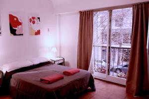 Ένα ή περισσότερα κρεβάτια σε δωμάτιο στο Ruda Hostel +22 φωτογραφίες
