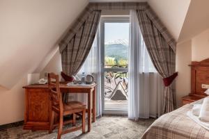 Posteľ alebo postele v izbe v ubytovaní Helan Family & SPA