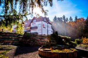 Vonkajšia záhrada v ubytovaní Elita Hotel & Restauracja