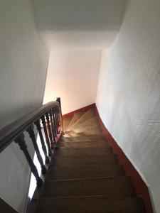 a staircase leading up to a building with a stair case at Chambre de 9m2 in Bagnolet