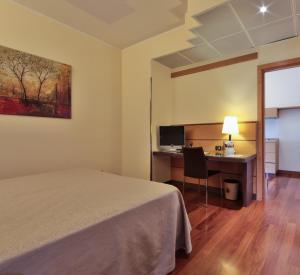 Postel nebo postele na pokoji v ubytování Best Western Hotel Dei Cavalieri