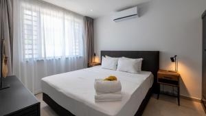 Letto o letti in una camera di Luxe Breeze