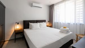 Letto o letti in una camera di Luxe Breeze