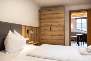 Posteľ alebo postele v izbe v ubytovaní Der Lammhof - Appartements Kaswurm