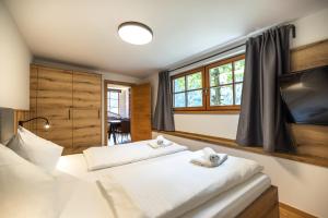 Posteľ alebo postele v izbe v ubytovaní Der Lammhof - Appartements Kaswurm