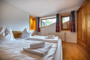 Posteľ alebo postele v izbe v ubytovaní Der Lammhof - Appartements Kaswurm