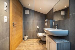 Kúpeľňa v ubytovaní Der Lammhof - Appartements Kaswurm