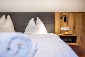 Posteľ alebo postele v izbe v ubytovaní Der Lammhof - Appartements Kaswurm