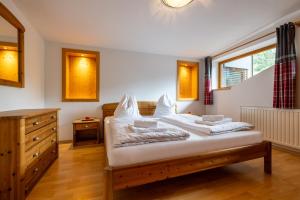 Posteľ alebo postele v izbe v ubytovaní Der Lammhof - Appartements Kaswurm