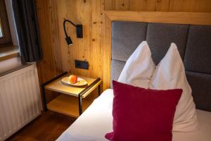 Posteľ alebo postele v izbe v ubytovaní Der Lammhof - Appartements Kaswurm