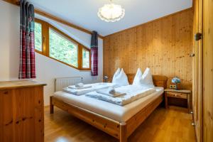 Posteľ alebo postele v izbe v ubytovaní Der Lammhof - Appartements Kaswurm
