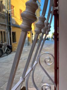 a pair of metal stands on a street at Casetta don Bosco in Chioggia