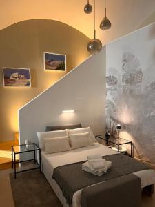 Postel nebo postele na pokoji v ubytování Alma B&B