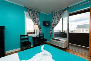 Postel nebo postele na pokoji v ubytování Charlroy Motel + 37 fotografií
