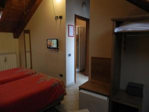 Postel nebo postele na pokoji v ubytování Osteria San Giuseppe