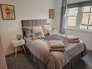 Ένα ή περισσότερα κρεβάτια σε δωμάτιο στο Tettenhall Cosy Apartment - Sleeps 4