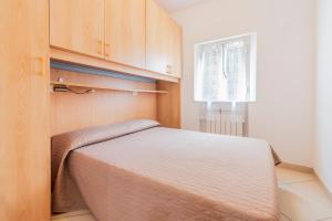 Postel nebo postele na pokoji v ubytování Camping Apuano