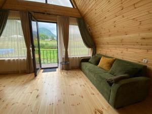 Posezení v ubytování Kamara Cottages