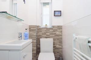 Vannituba majutusasutuses Sandy Gem - Viking Bay Getaway +25 fotot