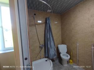 Vannituba majutusasutuses guest house udziro