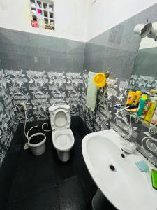 Koupelna v ubytování Haranya Homestay