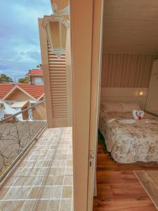 Cama ou camas em um quarto em Pousada Cabanas Rota do Sol