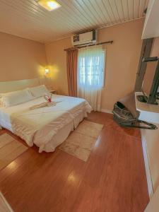 Cama ou camas em um quarto em Pousada Cabanas Rota do Sol