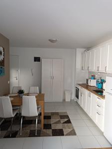 Kuchyňa alebo kuchynka v ubytovaní Apartment Matmar