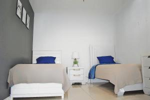 Ένα ή περισσότερα κρεβάτια σε δωμάτιο στο Weslaco Apt C 1